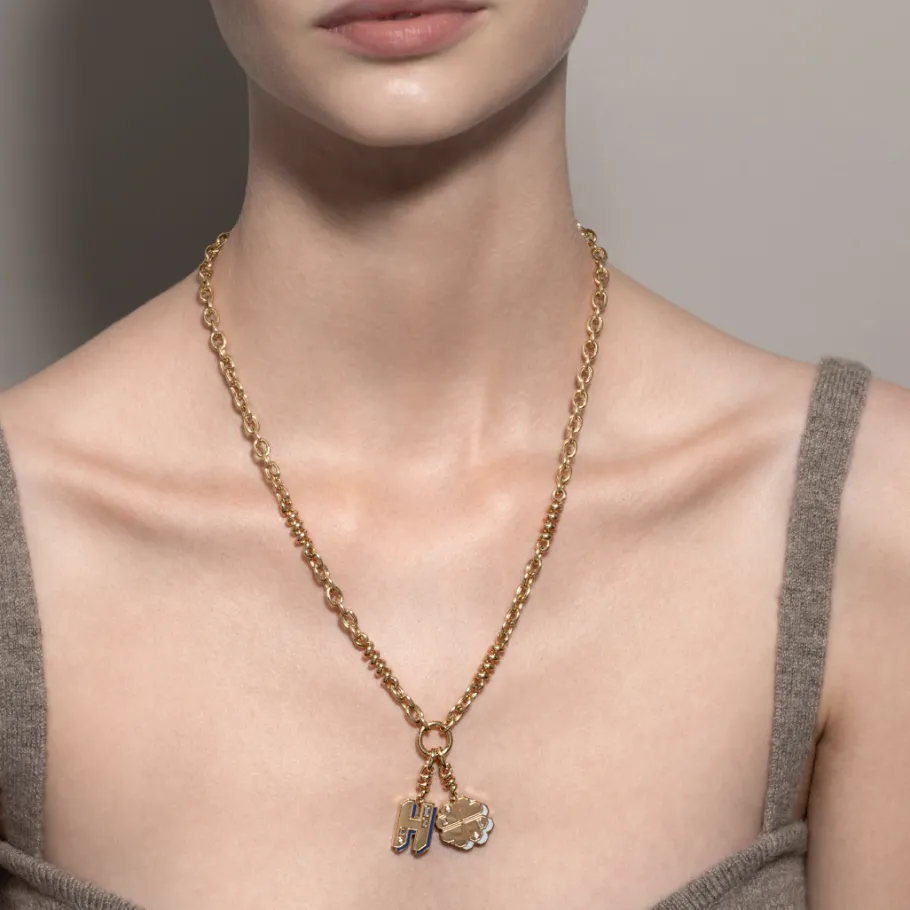 white_mother_of_pearl_yel_1-17.webp WHITE MOTHER OF PEARL YELLOW GOLD CLOVER LEAF CHARM>Boochier Online